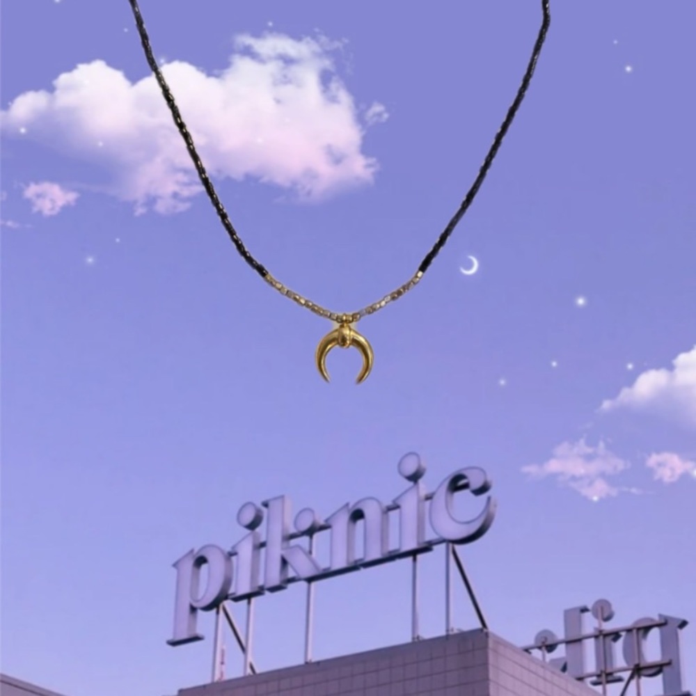 Gold & black necklace